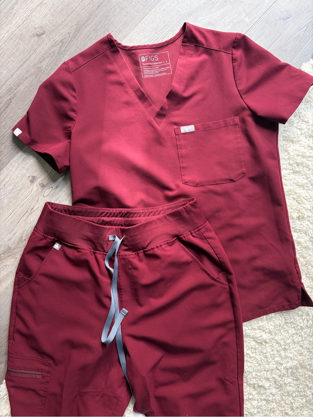 FIGS Women's Burgundy Scrub Top & Pants Set in Maroon